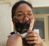 Kat and abandoned kitten, Olivo before adoption at the shelter. 2010